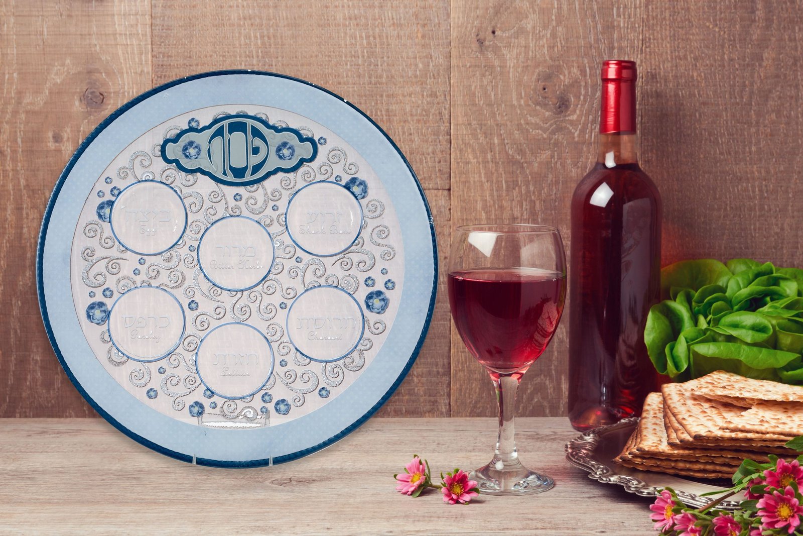 Passover celebration with wine and matzoh over wooden background